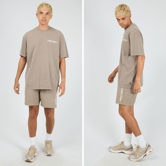 Silent Theory Essential Theory Swim Short in latte with vertical logo print on the leg, men's swim shorts available at Stewart's Menswear Mullumbimby.