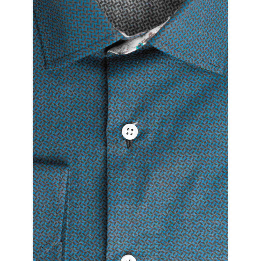 Stewarts Menswear Varce long sleeve shirt. Colour is teal with navy geometric pattern. Made from 100% cotton and featuring modern prints with a contrast print inside collar and cuffs, these shirts are perfect for the transition from Winter to Spring and can be dressed up or down depending on the occasion. Photo shows close up view of print.