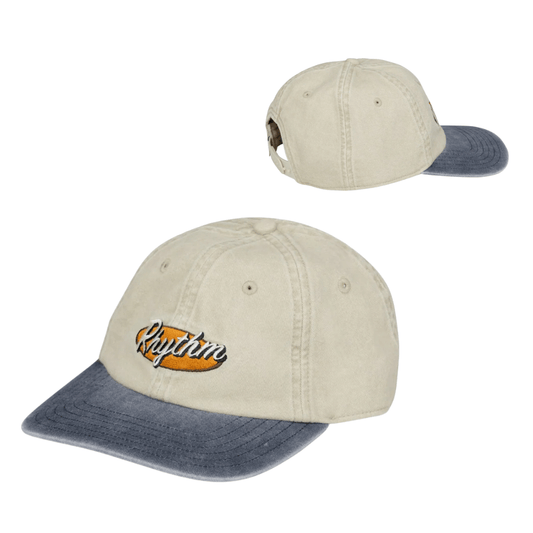 Rhythm Hallmark Cap available at Stewart’s Menswear Mullumbimby. Men’s cotton twill cap with embroidered logo and snap back. Product photo showing both front and back views.