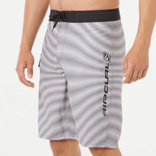 Front View of model wearing Rip Curl Shock Wave Boardshort Cool Grey available at Stewart’s Menswear Mullumbimby. Men’s quick-dry DWR surf shorts with side pocket.