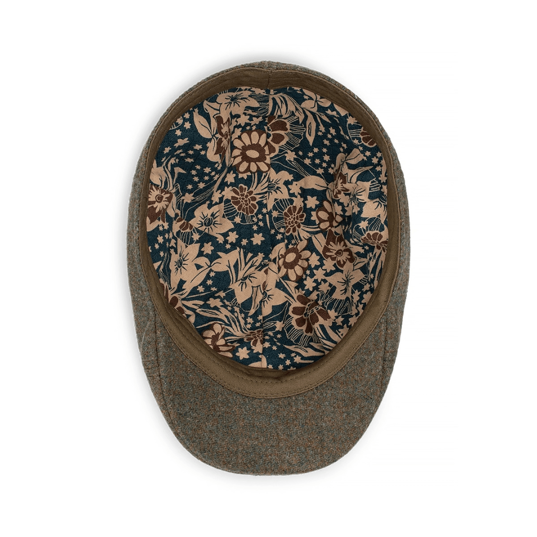Photo showing lining inside Avenel Hats Marvin cheesecutter cap in olive available at Stewart’s Menswear Mullumbimby.