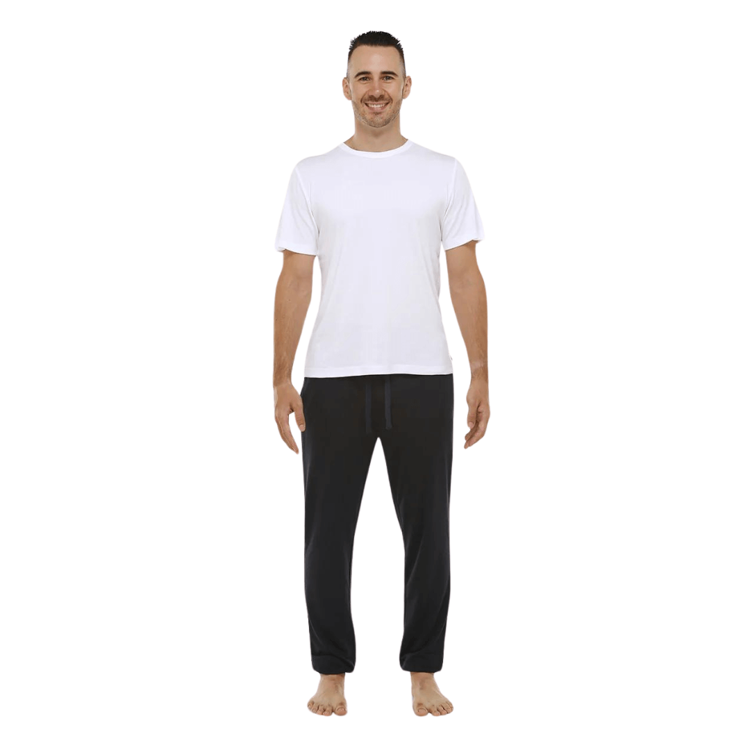 Stewarts Menswear Bamboozled bamboo jersey sleep pants. Made from a sustainable Bamboo blend, they are luxuriously soft and breathable and will have you feeling relaxed in no time at all. Elasticised waist with front tie. Photo shows model wearing black sleep pants with white t-shirt.