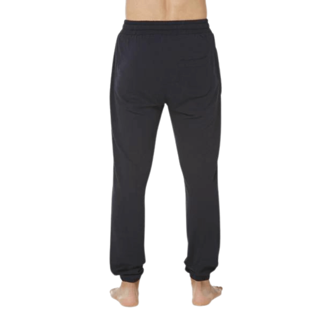Stewarts Menswear Bamboozled bamboo jersey sleep pants. Made from a sustainable Bamboo blend, they are luxuriously soft and breathable and will have you feeling relaxed in no time at all. Elasticised waist with front tie. Photo shows model wearing navy sleep pants (back view).