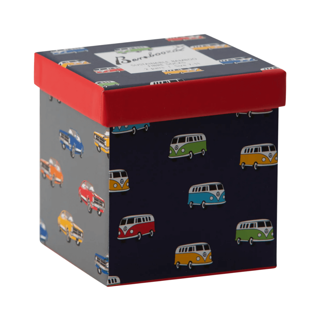 Stewarts Menswear Bamboozled socks 2 pack gift box. This Gift Box is the perfect gift, featuring two pairs of novelty crew socks packaged in a matching Gift Box.  Bamboozld Gift Boxes have a vibrant collection of quirky bamboo-blend socks which pack a playful punch. Theme is Rev Head. One x denim blue socks, one by grey socks. Image is of box only featuring combi vans and sports cars.