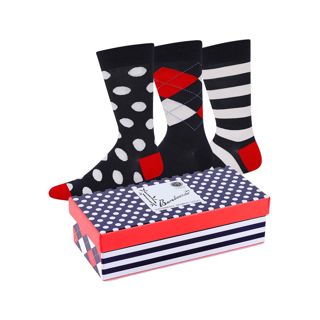 Stewarts Menswear Bamboozled socks 3 pack gift box. Spots and Stripes, Navy. Stewarts Menswear Bamboozled socks 3 pack gift box. This Gift Box is the perfect gift, featuring three pairs of novelty crew socks packaged in a matching Gift Box.  Bamboozld Gift Boxes have a vibrant collection of quirky bamboo-blend socks which pack a playful punch. 1 x navy with white spots, 1 x navy with white stripes, 1 x navy with plaid design.
