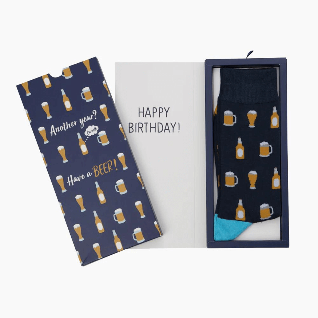 Stewarts Menswear Bamboozld Socks. Sock gift card. Not only do you get a quality pair of Bamboo blend socks the recipient will love, but it comes packed in a matching Gift Card. Beer themed socks featuring beer print all over packed in a matching "Another Year? Have a Beer!" gift card.