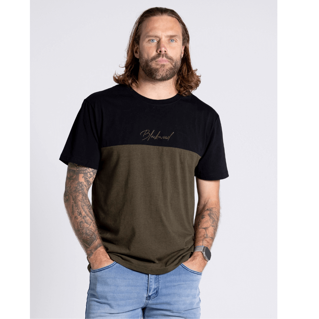 Stewart's Menswear Blackwood Apparel Tilbury T-shirt. Features a contrast block design in black and khaki, a ribbed crew neck and an embroidered logo on the chest. Photo shows model wearing Blackwood Tilbury T-shirt front view.