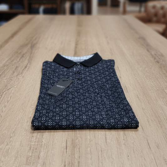 Stewarts Menswear, Mullumbimby. Boulvandre print polo shirt. Black background and collar with all over white geometric diamond shape print.
