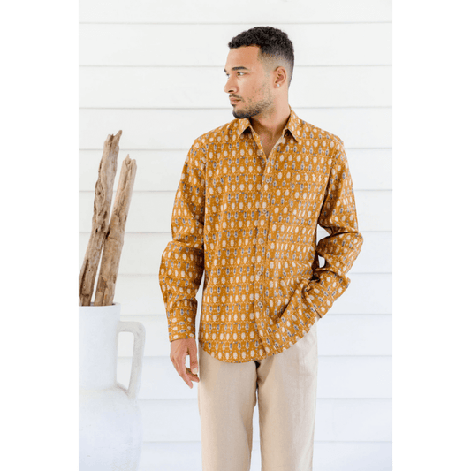 Men's hemp-cotton long sleeve shirt in mustard with a cream and navy print, available at Stewart's Menswear Mullumbimby.