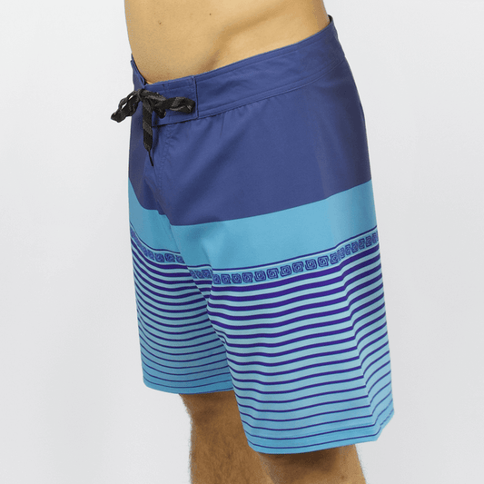 Carve Tavarua Boardshort – available at Stewart’s Menswear Mullumbimby. Regular fit men’s recycled boardshort with 19” outleg, drawcord waist, and zip pocket. Sublimiated stripe print in shades of blue.