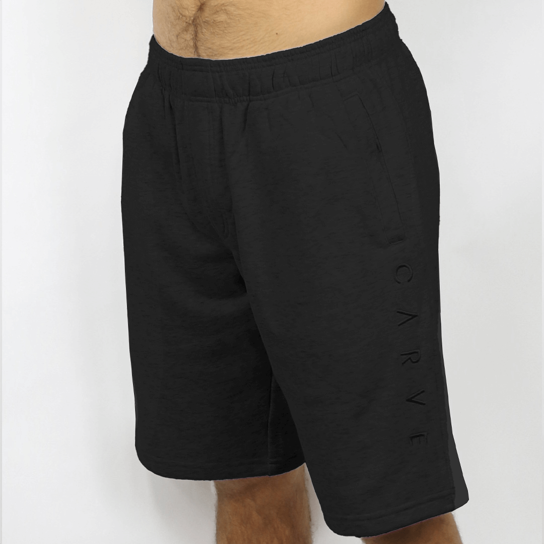 Stewarts Menswear Carve clothing Jogger Men's elastic waist sport short. Colour is black with black embroidered logo down one leg.