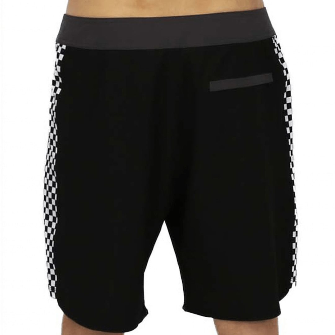 Back view of Carve Checkmate Boardshorts in black with white and black checkerboard side panel and Carve logo, available at Stewart's Menswear Mullumbimby.