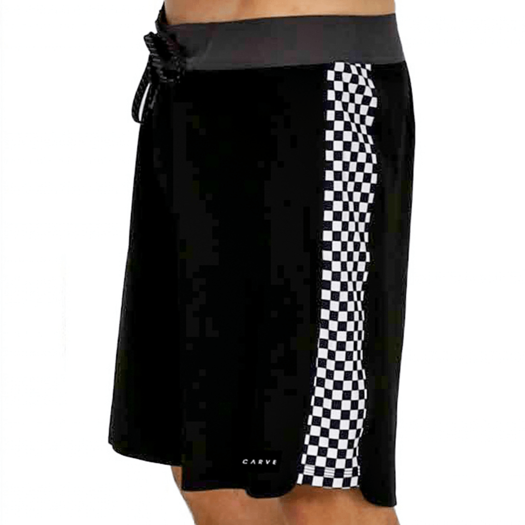 Carve Checkmate Boardshorts in black with white and black checkerboard side panel and Carve logo, available at Stewart's Menswear Mullumbimby.