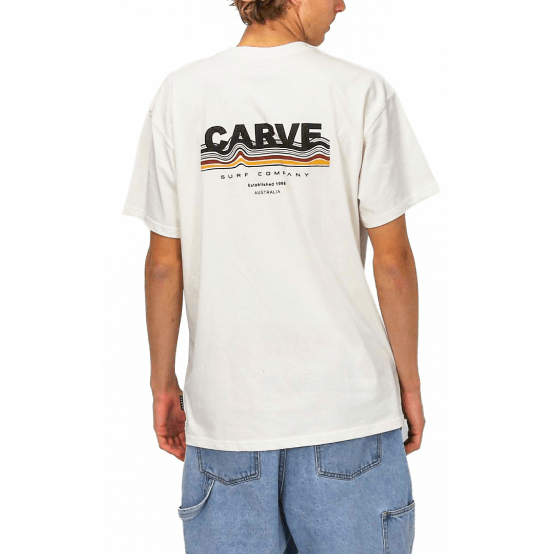 Back View of Carve Decade Tee in Whipped Butter, men's off-white cotton tee with retro Carve Surf Company wave print on the back, available at Stewart's Menswear Mullumbimby.