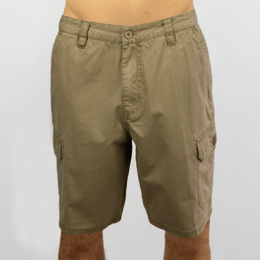 Carve Fort Men’s Cargo Shorts available at Stewart’s Menswear Mullumbimby. Front view of cotton cargo shorts with side, back, and logo badge pocket. Colour is khaki.