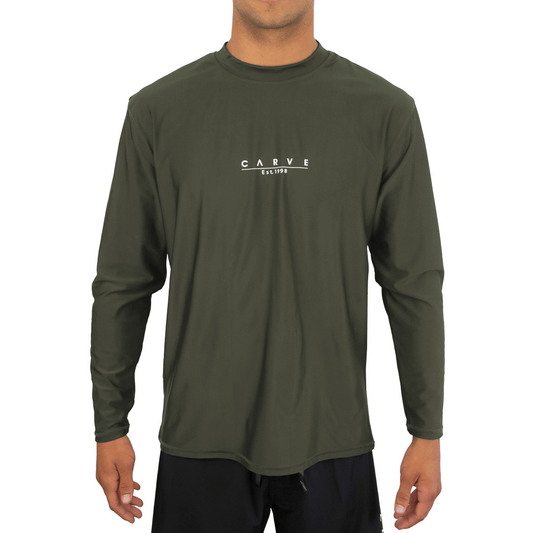 Stewarts Menswear Carve Boys Insignia Long Sleeve Rashie.Boy's long sleeve tee style rashie with 50+UPF Rating  Small Carve logo chest print. Colour is Khaki. 