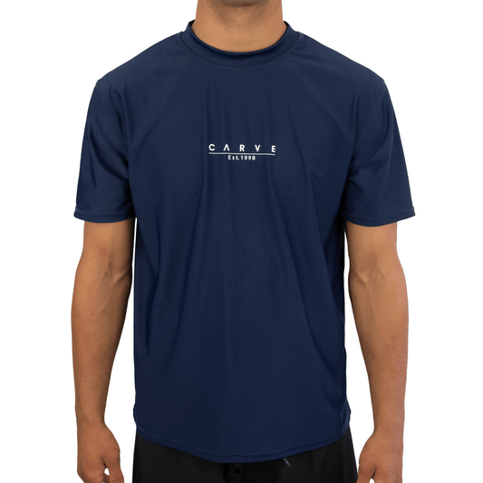 Stewart's Menswear Carve Men's Insignia short sleeve rashie. Men's short sleeve swim Rashie with small Carve chest print. Colour is Navy.