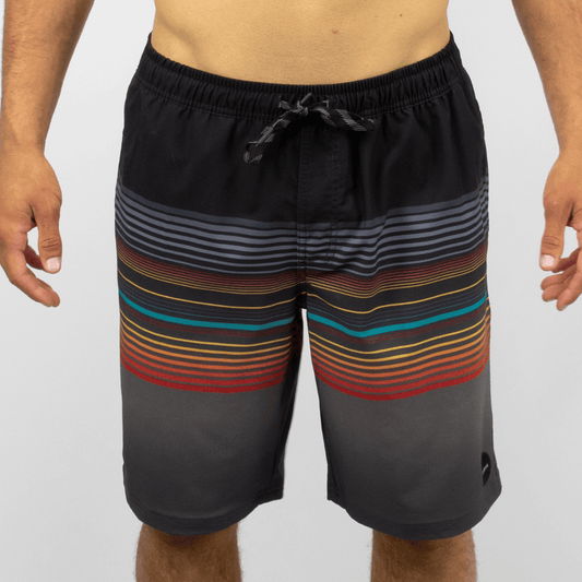 Carve Jan Juc Boardshort  available at Stewart’s Menswear Mullumbimby. Men’s elastic waist recycled boardshorts with drawcord and zip pocket. Black base with multi coloured small stripes.