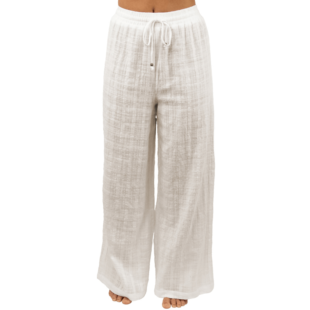 Stewart's Menswear Carve Ladies Koloa Beach Pants. Elastic waist women's beach pant with Carve flag on back pocket. Relaxed fit and made from cotton viscose with jacquard weave. Colour is white.