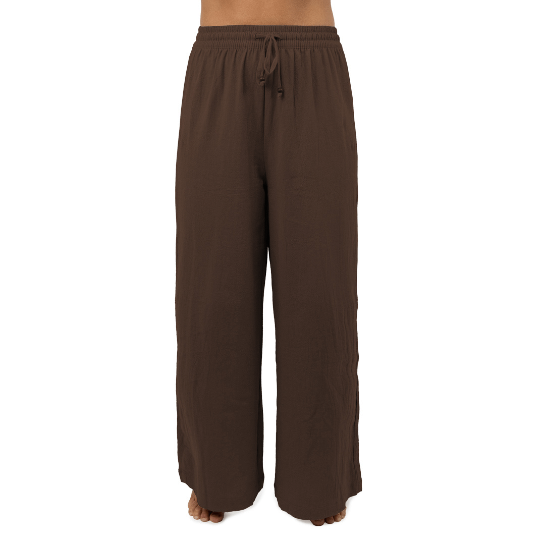 Stewart's Menswear Carve ladies Lanai Beach Pants. Elastic waist women's beach pant with Carve flag on back pocket. Relaxed fit and made from 100% Cotton. Colour is Chocolate.