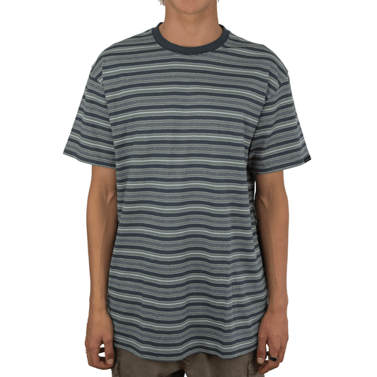 Stewarts Menswear Carve Men's Lineup Tee Shirt. This is a regular fit men's short sleeve T-shirt with all over stripe print in shades of olive and Carve flag on sleeve.