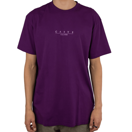 Stewarts Menswear Carve Reformer Tee. a regular fit men's short sleeve T-shirt with simple Carve chest print. Colour is Blackberry, ,a rich purple colour.