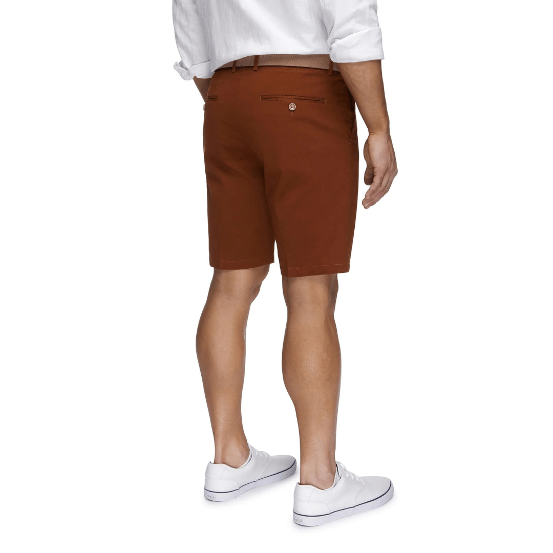 Stewarts Menswear City Club Ariel chino short. Colour is Rust. Photo shows model wearing City Club Ariel Shorts back view.