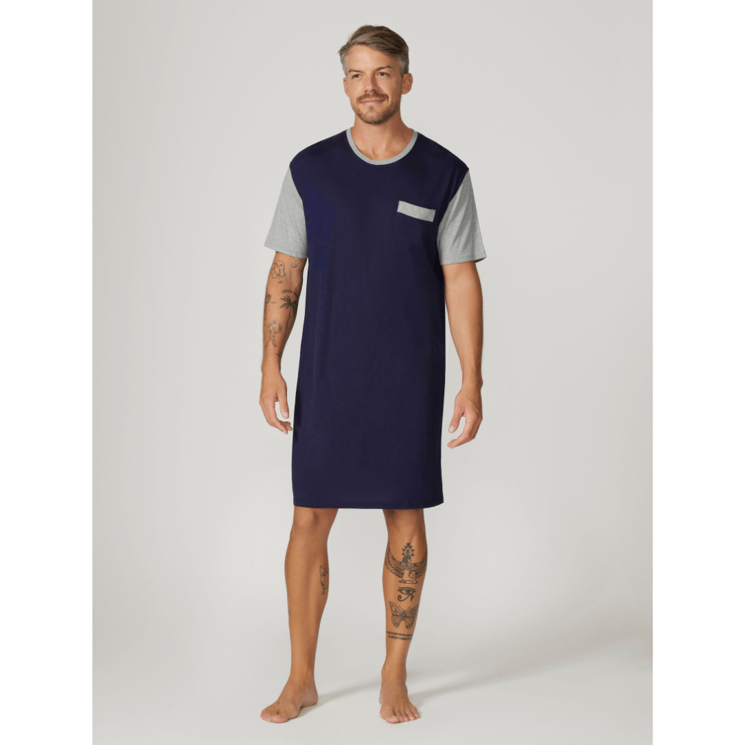 Stewarts Menswear Contare Country Men's nightshirt. Bamboo cotton short sleeve nightshirt. Colour is navy with great sleeves and neck trim. Photo shows model wearing Contare Bamboo Cotton Short Sleeve Nightshirt, front view.