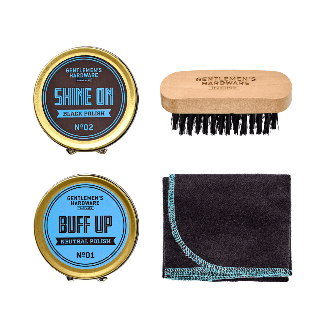 Photo showing contens of Gentleman's Hardware Shoe Shine Kit in tin with black and neutral polish, brush and cloth, available at Stewart's Menswear Mullumbimby.