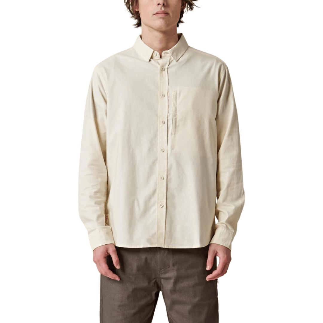 Stewarts Menswear Globe foundation long sleeve shirt  - bleach free/dye free. The Globe Foundation Long Sleeve Shirt is your go-to button-up for every occasion. Crafted with comfort, durability, and eco-awareness in mind, this shirt is the perfect blend of style and sustainability. Choose the Globe Foundation Long Sleeve Shirt to support sustainable fashion and make a positive impact on the environment. Join the conscious consumer movement and embrace fashion that cares for the planet. 