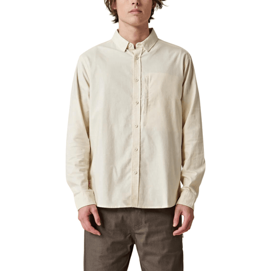 Stewarts Menswear Globe foundation long sleeve shirt  - bleach free/dye free. The Globe Foundation Long Sleeve Shirt is your go-to button-up for every occasion. Crafted with comfort, durability, and eco-awareness in mind, this shirt is the perfect blend of style and sustainability. Choose the Globe Foundation Long Sleeve Shirt to support sustainable fashion and make a positive impact on the environment. Join the conscious consumer movement and embrace fashion that cares for the planet. 