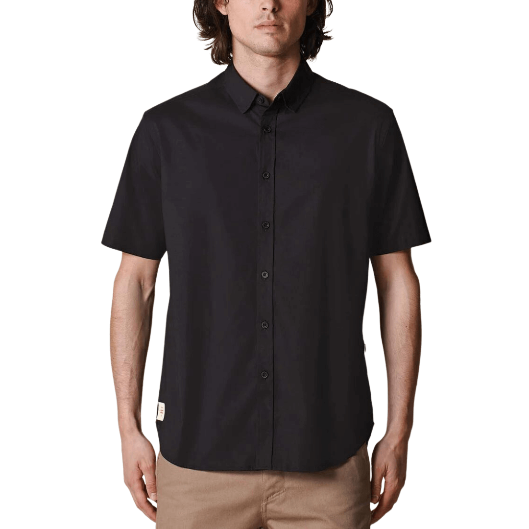 Stewarts Menswear Globe foundation short sleeve shirt - Black. The Globe Foundation Short Sleeve Shirt is your go-to button-up for every occasion. Crafted with comfort, durability, and eco-awareness in mind, this shirt is the perfect blend of style and sustainability. support sustainable fashion and make a positive impact on the environment. Join the conscious consumer movement and embrace fashion that cares for the planet. 