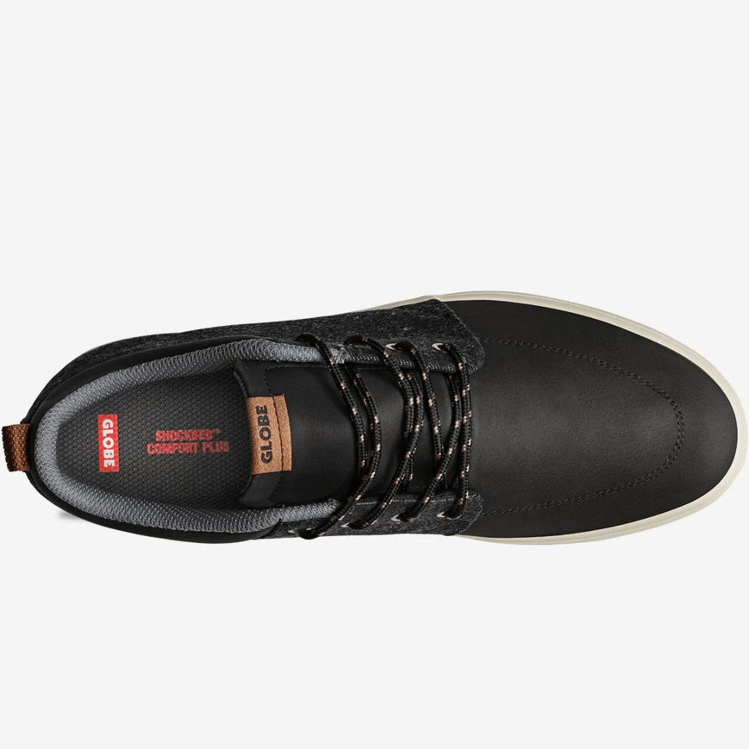 Stewart's Menswear Globe GS Chukka skate shoe, Black/denim top view. The Globe GS Chukka skate shoe in Black/Denim is a mid-cut version of the GS shoe and feature Globe's Shockbed™ insole for all day comfort.  The Super-V™ outsole ensures excellent grip and board feel, making these shoes ideal for skating or casual wear.  The recycled PU/Denim upper adds durability while reducing your environmental impact. 