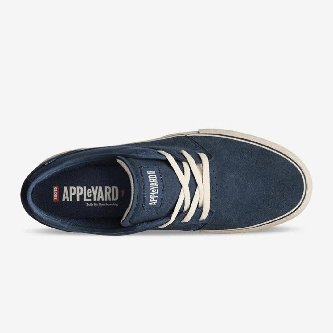 Stewarts Menswear Globe Mahalo Navy Antique top view. Designed for skateboarding with Mark Appleyard, The Mahalo in Navy/Antique is a proven classic. The upper is made from Suede and canvas and features Globe's Shockbed™ insole for impact control and Super-V™ out-sole for enhanced grip and board feel.