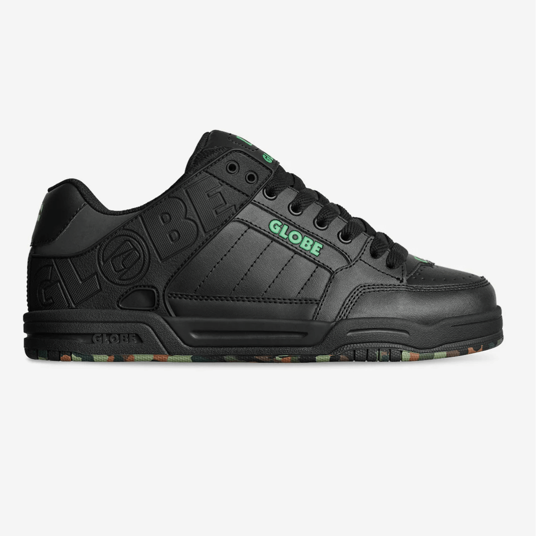 Stewart's Menswear, Mullumbimby. Globe Skate Shoe Tilt Black/Green/Mosaic. Photo shows side view of shoe. Predominantly black bulky style skate shoe with Green Globe branding.