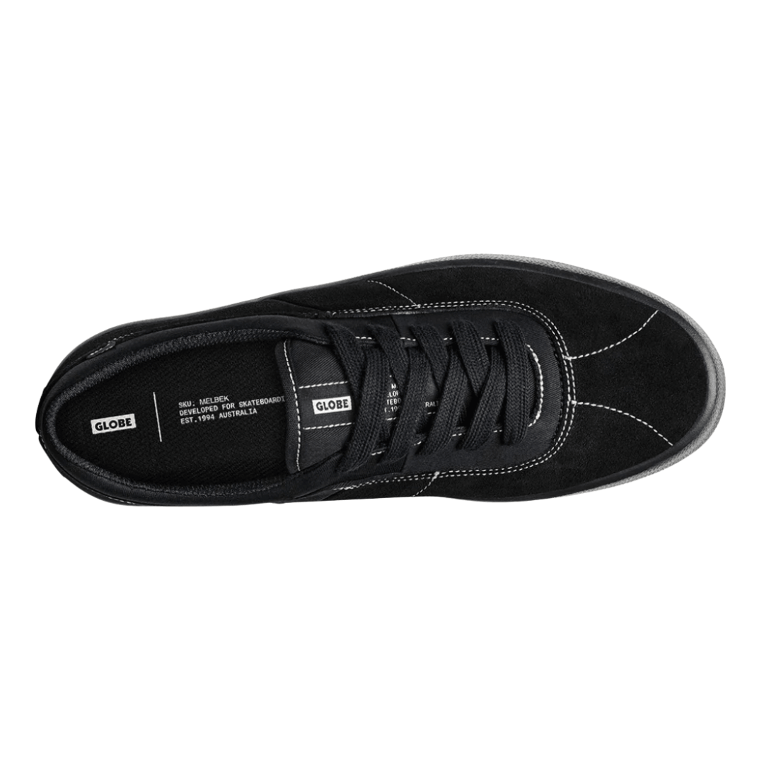 Top view of Globe Melbek Skate Shoe in black with white contrast stitching. Suede upper, padded collar and rubber outsole, men's skate sneakers available at Stewart's Menswear Mullumbimby.