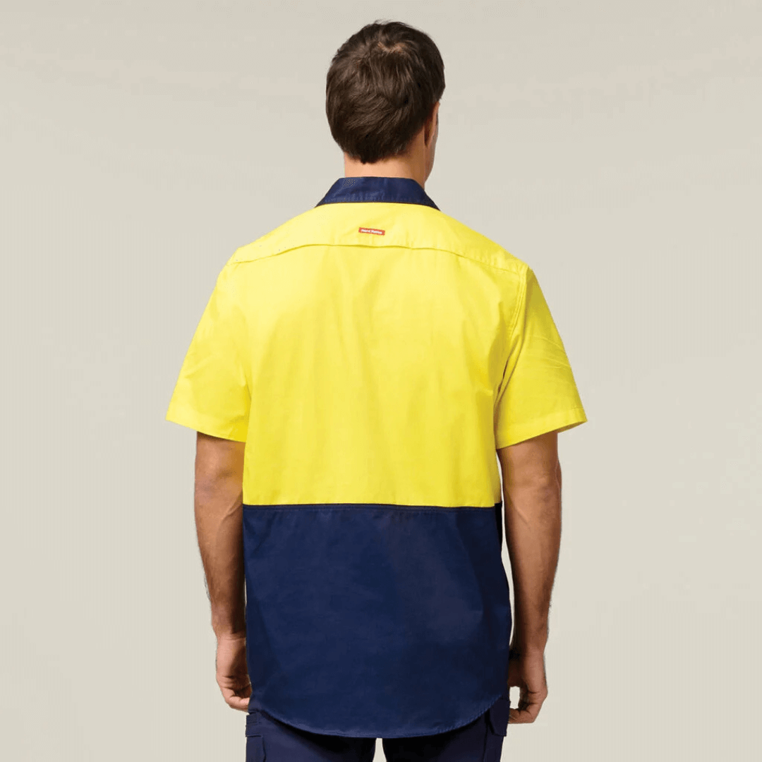 Back view of Hard Yakka Core Hi-Vis Lightweight Vented Short Sleeve Cotton Drill Shirt UPF 50+ with chest pockets, available at Stewart’s Menswear Mullumbimby. Y04620