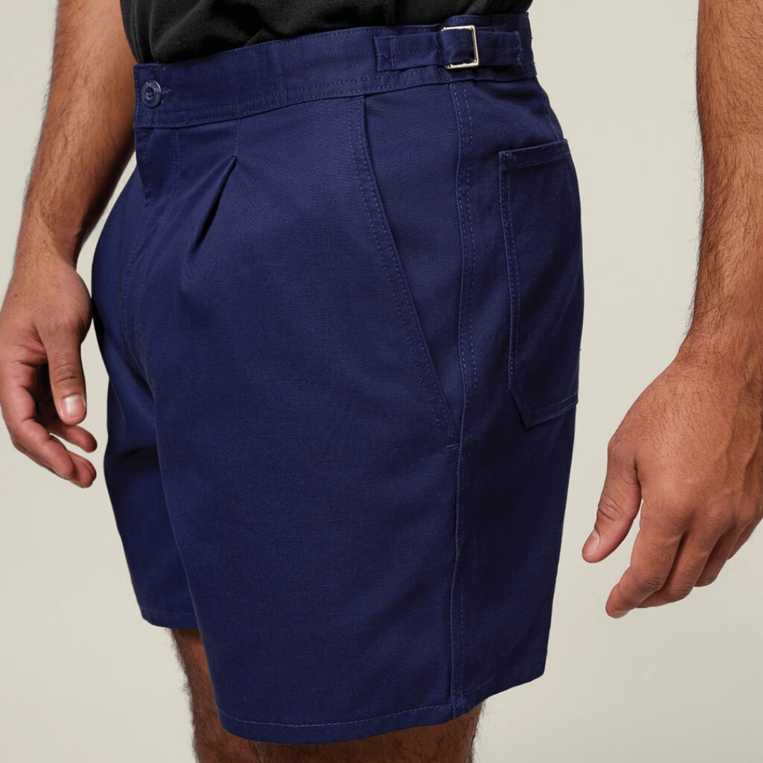Close up view of Navy coloured Hard Yakka relaxed fit cotton drill shorts with side tabs available from Stewart's Menswear, Mullumbimby.