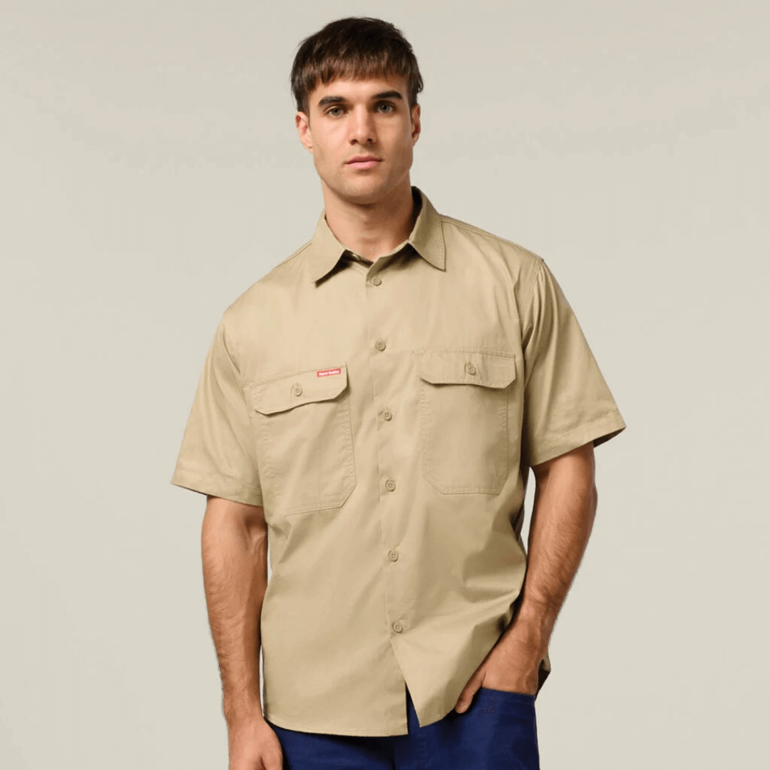 Front View of Khaki coloured Hard Yakka Core Short Sleeve Lightweight Vented Cotton Shirt with mesh venting and twin chest pockets, available at Stewart’s Menswear Mullumbimby.