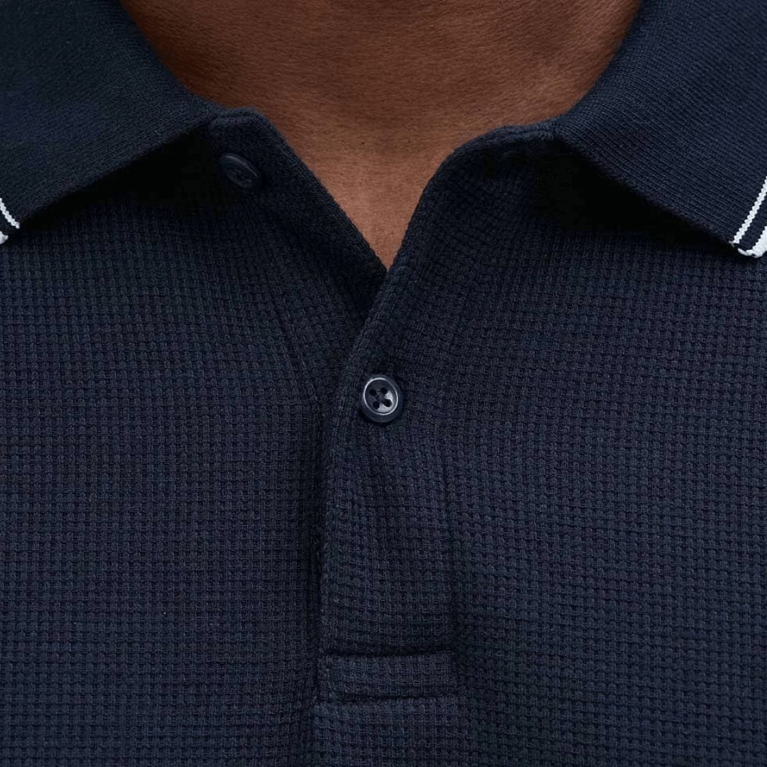 Close up photo showing fabric texture of Jack & Jones Austin Polo Shirt in Sky Captain, men's cotton jersey polo with classic collar, available at Stewart's Menswear Mullumbimby.