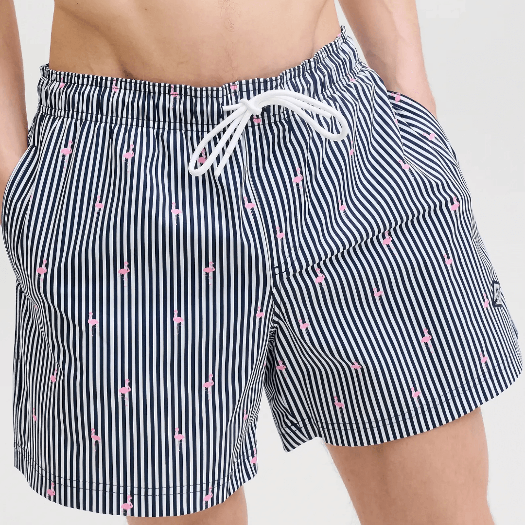 Jack & Jones Maui Breeze Mini Stripe Swim Short in navy blazer with pink flamingo print, available at Stewart's Menswear Mullumbimby.