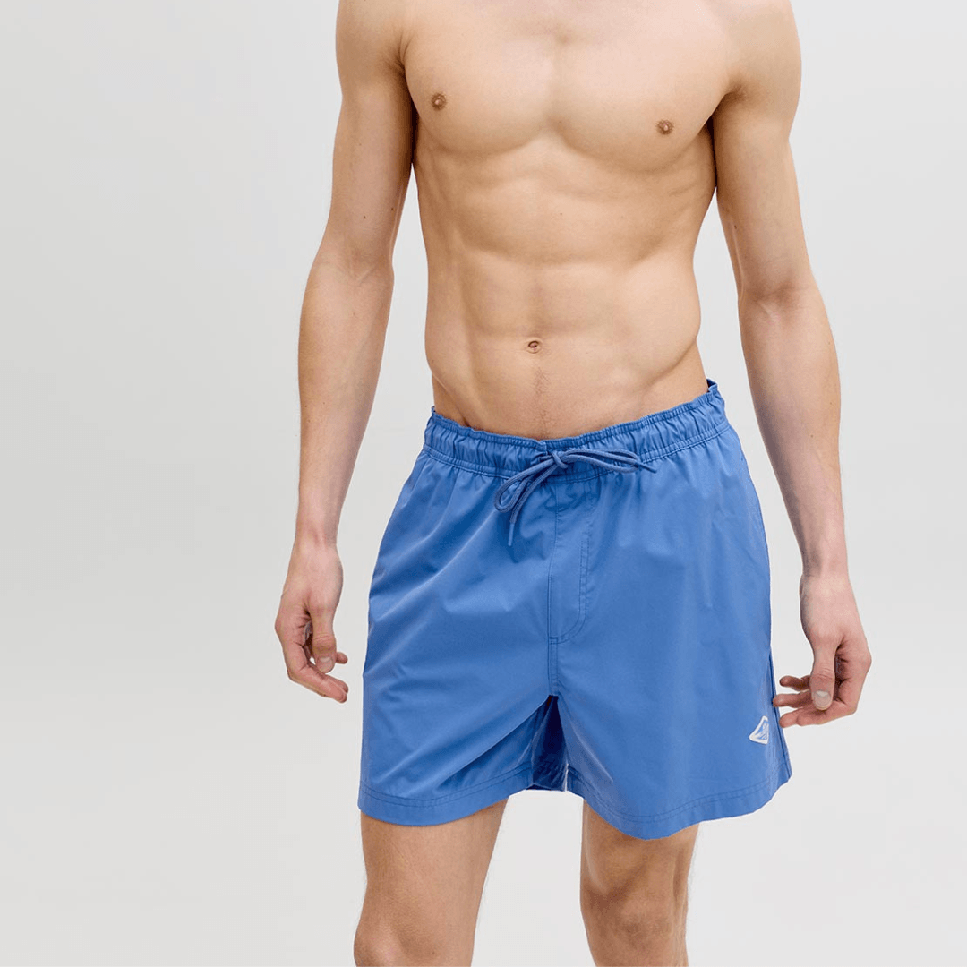 Jack & Jones Maui Tropic Solid Swim Short in Delft blue, men's recycled polyester swim shorts available at Stewart's Menswear Mullumbimby.