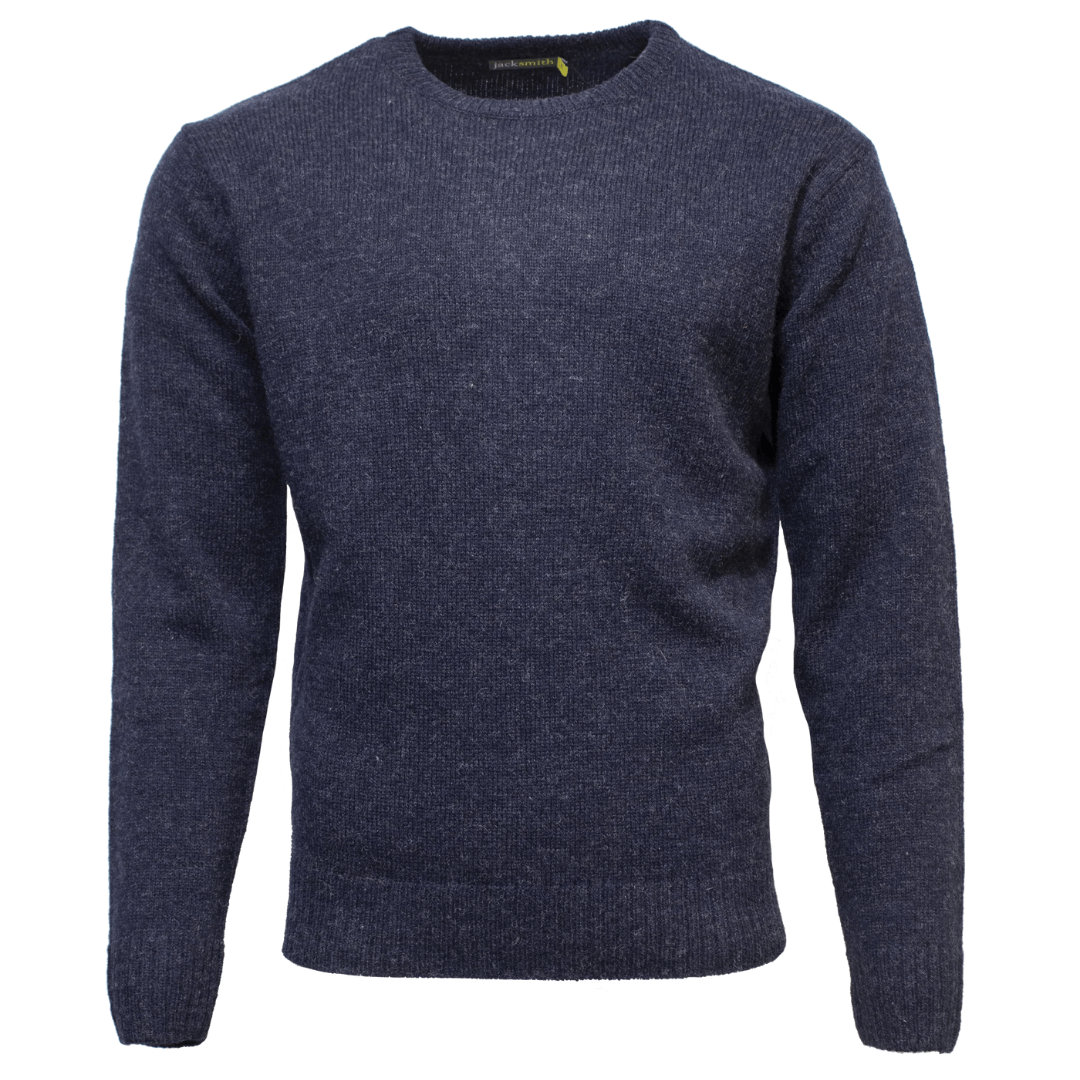Stewarts Menswear Jack Smith Shetland wool crew neck pullover. The Jack Smith Shetland Wool Crew Neck Pullover is a classic men's knitted jumper which features a crew neck, regular fit, and rib knit cuffs and waist. Made from 100% shetland wool, it offers warmth and softness, ensuring you stay cosy and comfortable through the chilly winter months. Colour is denim.