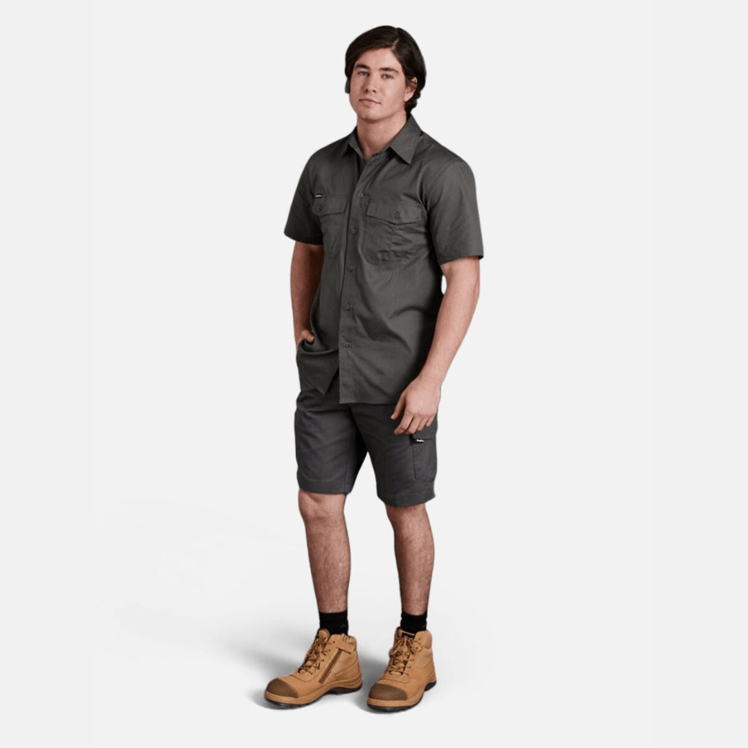 Model wearing green coloured King Gee workcool 2 ripstop cotton cargo work shorts and King Gee workcool 2 ripstop cotton vented work shirt.