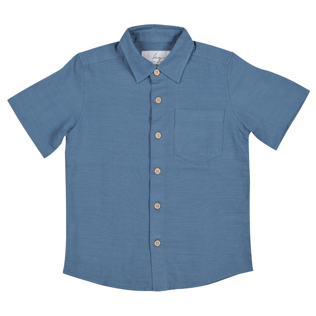 Kingston Grange Boys’ Bamboo Short Sleeve Shirt available at Stewart’s Menswear Mullumbimby. Blue steel is a plain light blue coloured shirt.