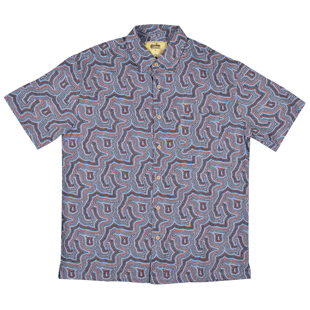 Stewart's Menswear Kingston Grange Bamboo Dreaming men's short sleeve shirt - Lukarrara Jukurrpa. Bamboo clothing is perfect to wear in our climate and it’s better for the planet too! Bamboo clothing feels soft and silky, a very luxurious fabric which is comfortable to wear. It’s anti static so it sits on the body nicely without clinging. It is also hypoallergenic, breathable and absorbent. This men's bamboo shirt named Native Seed features an aboriginal print with colours predominately blue and mauve.