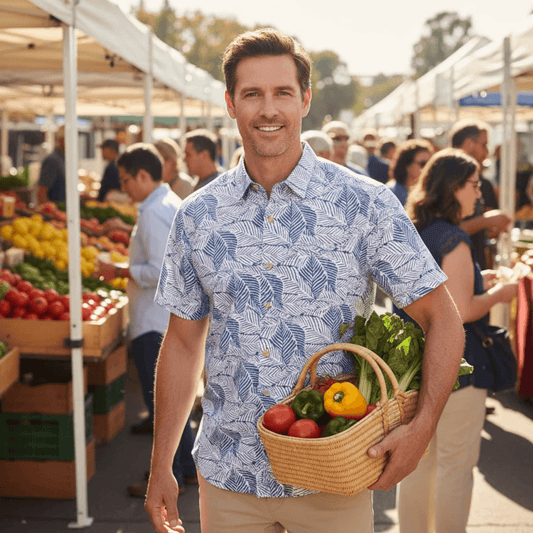 Lifestyle photo of a man wearing Kingston Grange Bamboo Shirt shopping at the farmers market.