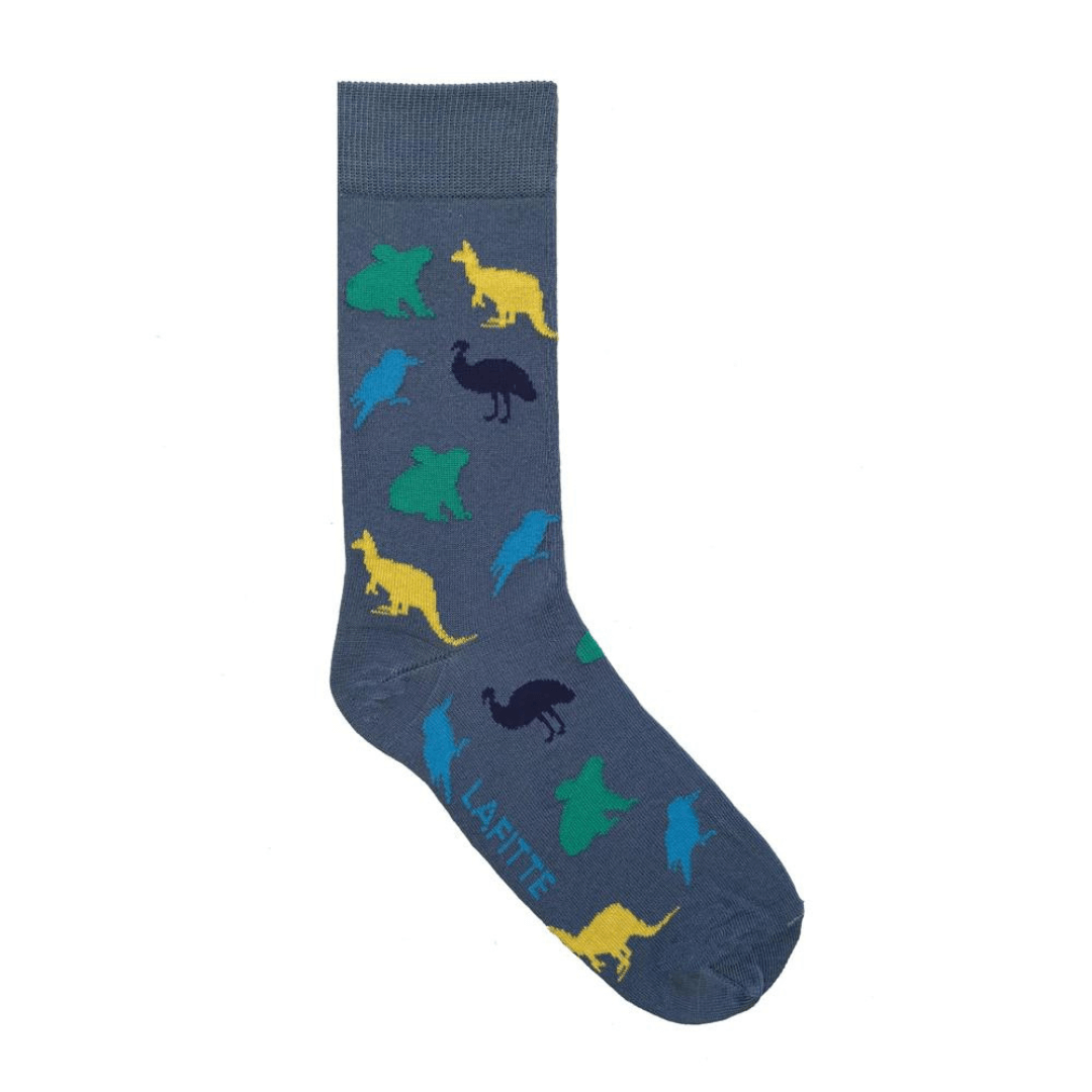 Stewarts Menswear Lafitte Australian made socks. Colour is denim blue. Silhouettes of Australian animals all over in colours yellow, aqua, teal and black.