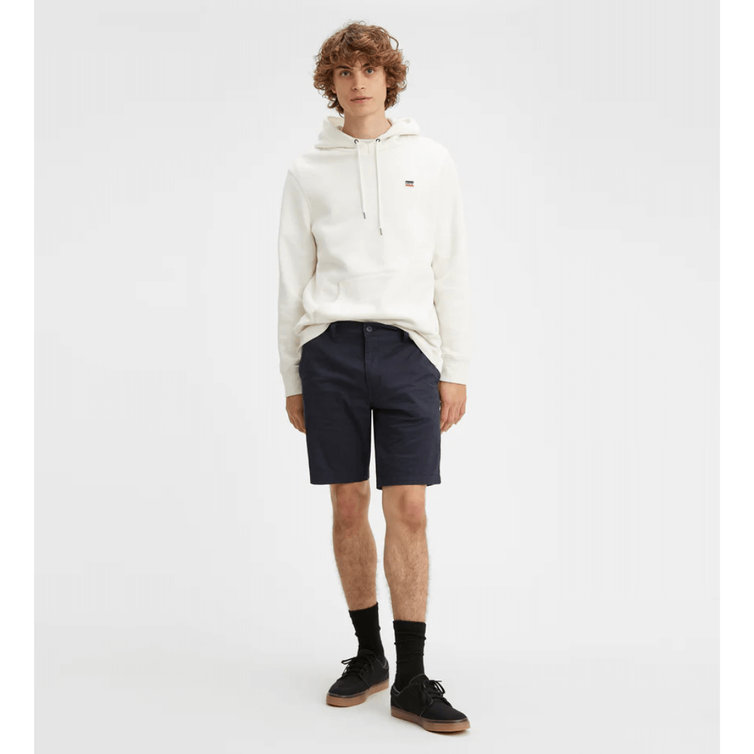 Stewarts Menswear Levi's XX Standard Chino short. Photo shows model wearing Levi's XX Standard Chino Short, Front View. Colour is Baltic Navy.