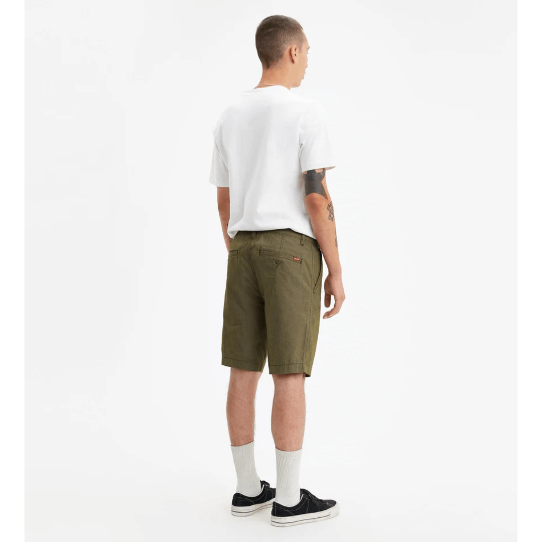 Stewarts Menswear Levi's XX Standard Chino short. Photo shows model wearing Levi's XX Standard Chino Short, Back View. Colour is Olive Night.